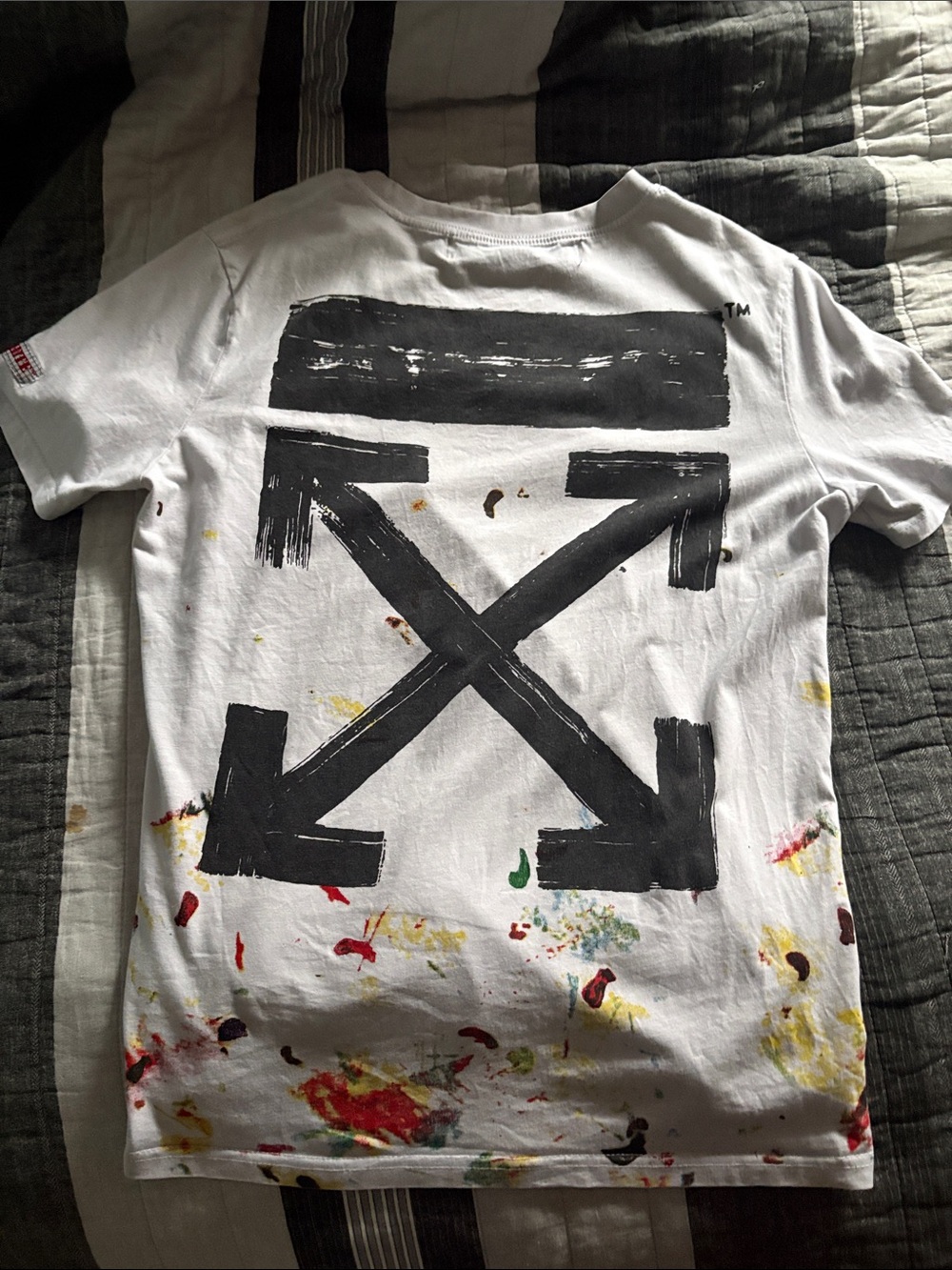 Paint splatter off white shirt